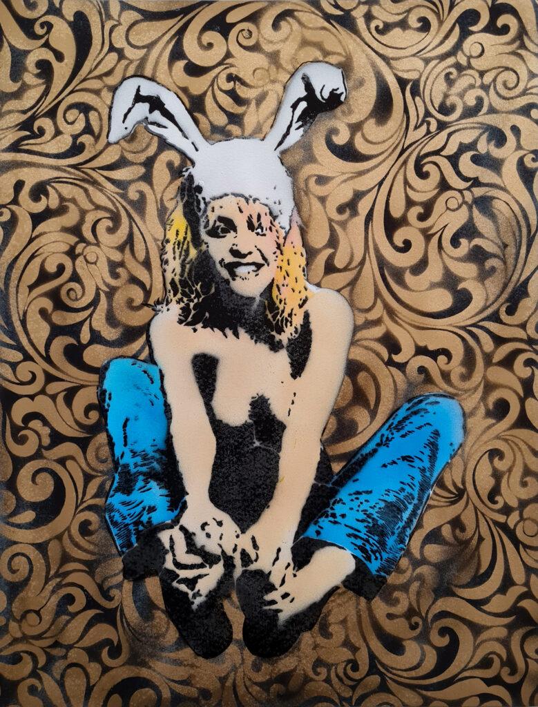 A hand-painted poster by White Rabbit depicting the "Bunny Flying" figure sitting cross-legged against an ornate black and gold floral background.